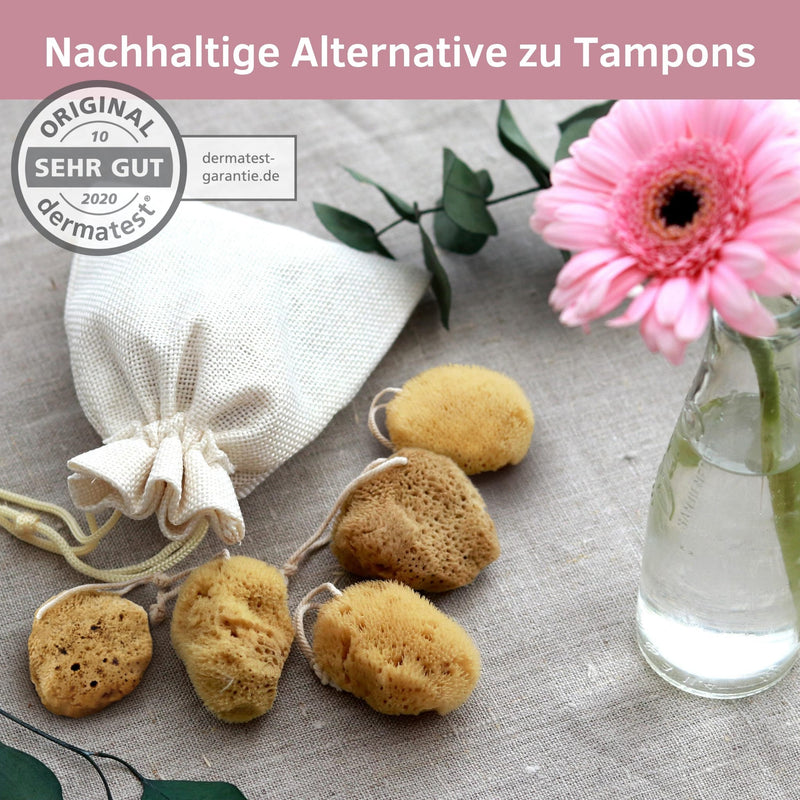 Menstruationsschwamm mit Kordel im Leinenbeutel mit rosa Blume